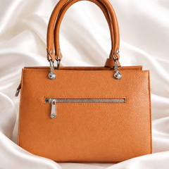 Michael Kors Sutton Medium Leather Satchel handbag in a brown color.