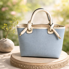 Miu Miu Beau top-handle bag in a canvas and leather material combination