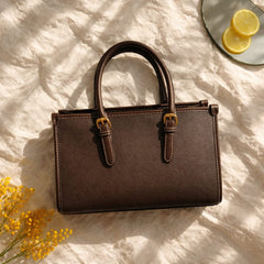 David Jones double-buckled faux leather shoulder bag.