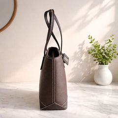 a brown faux leather David Jones shoulder tote bag.