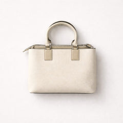 Louis Vuitton handbag in a light beige