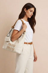 Miu Miu Nappa Ivy bag in talco leather.