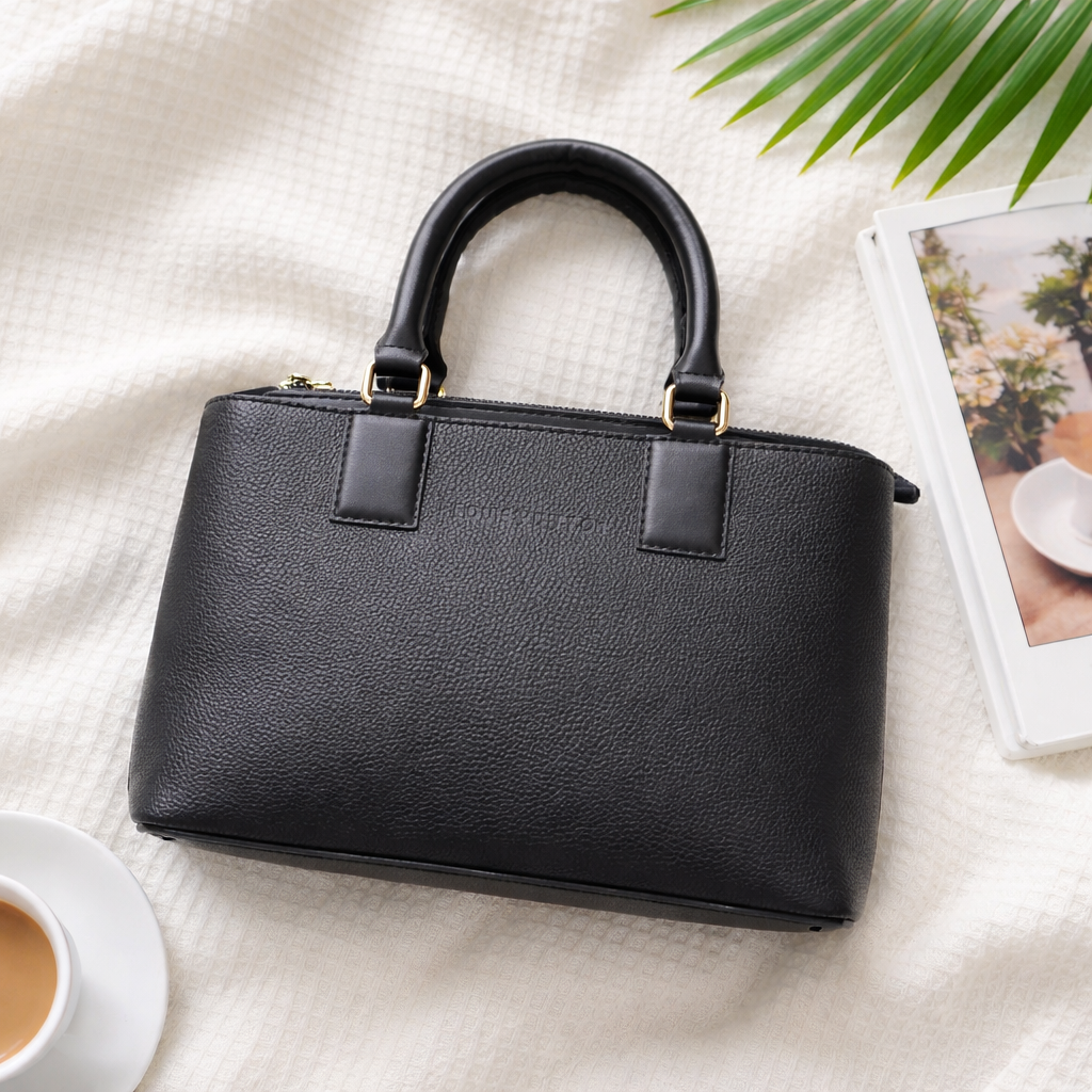 Louis Vuitton black leather satchel bag. 