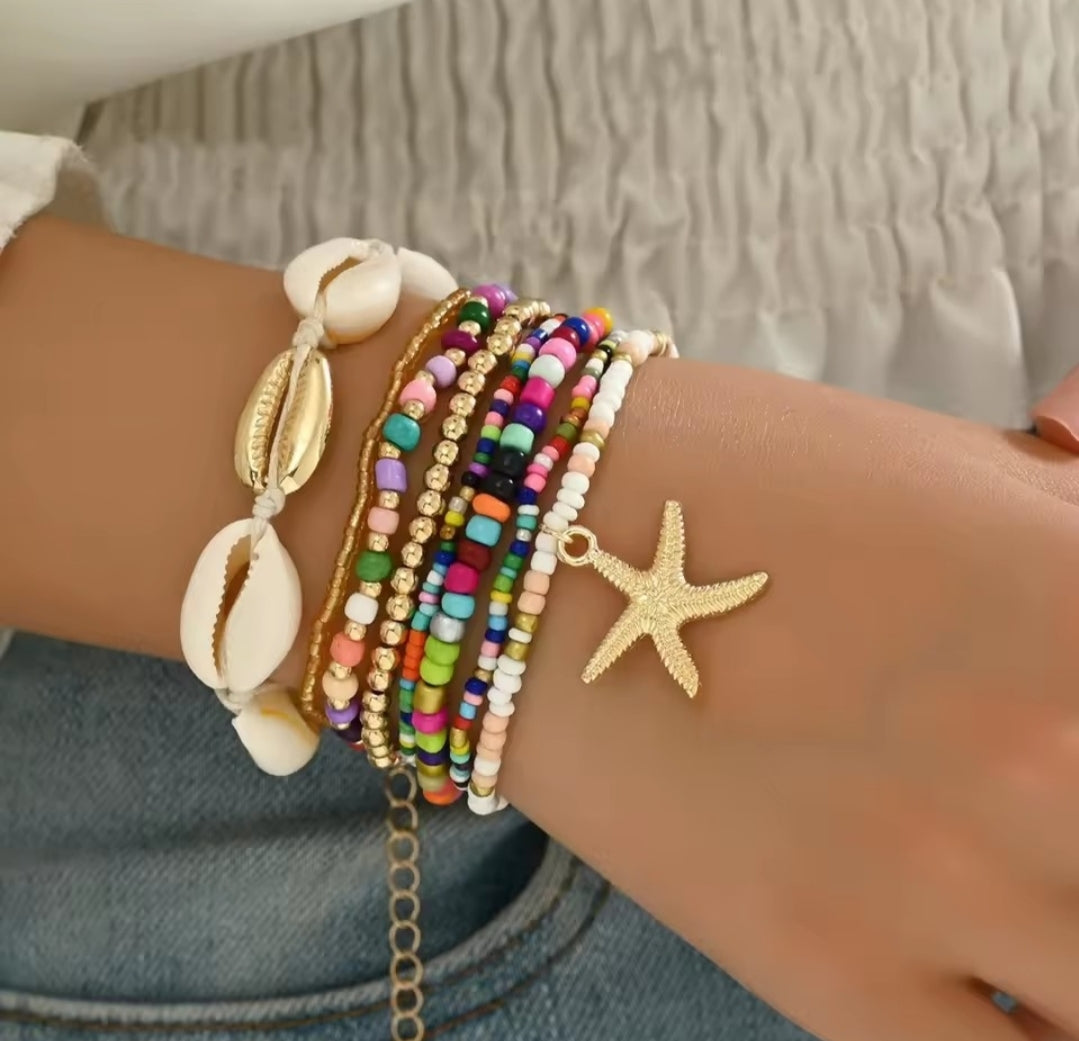 This Bohemian-style seashell and starfish bracelet set is generally listed as a 7-piece