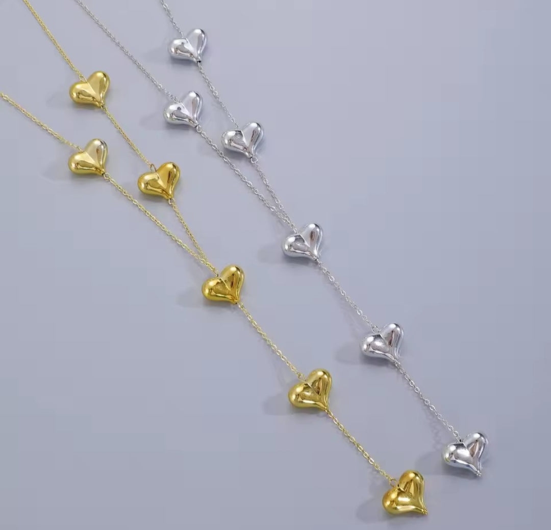 a "Simple Y-shaped Love Heart Shape Tassel Necklace" often marketed for women as a long sweater chain.