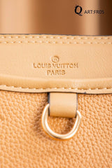 Louis Vuitton Trianon MM bag in black Monogram Empreinte leather.