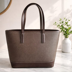 a brown faux leather David Jones shoulder tote bag.