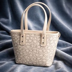 Calvin Klein  Tote bag in a beige with the brand's monogram pattern